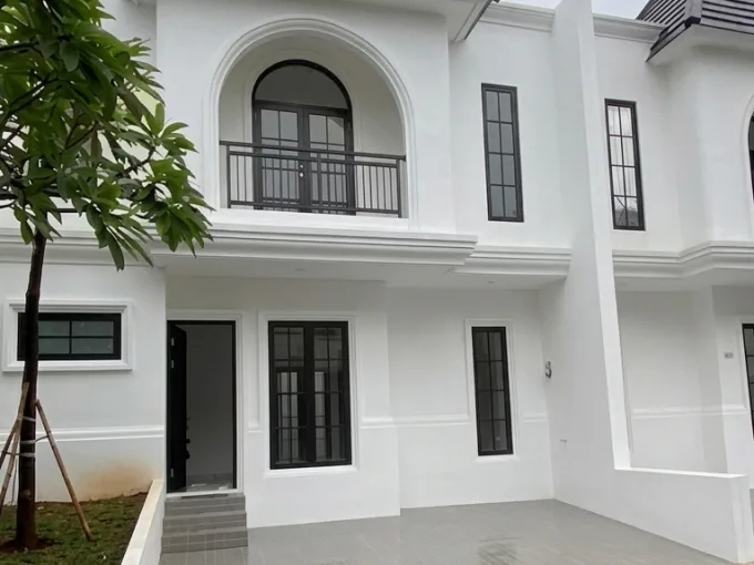 White Two story Townhouse with an Arched Balcony Window and Black framed Windows on a Grey tiled Front Entrance Area Tree to the Left  Rooma21com