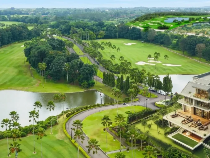 Aerial View of a Modern Luxury House Beside a Pristine Golf Course with a Lake and Palm Trees  Rooma21com