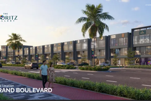 Promotional Image of Ruko the Floritz Gallery Grand Boulevard Shopping Complex with Palm Trees and a Couple Walking on a Red Brick Sidewalk Along a Multistorey Plaza Road at Dusk  Rooma21com
